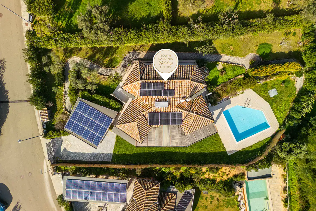 aerial view of a house with a swimming pool