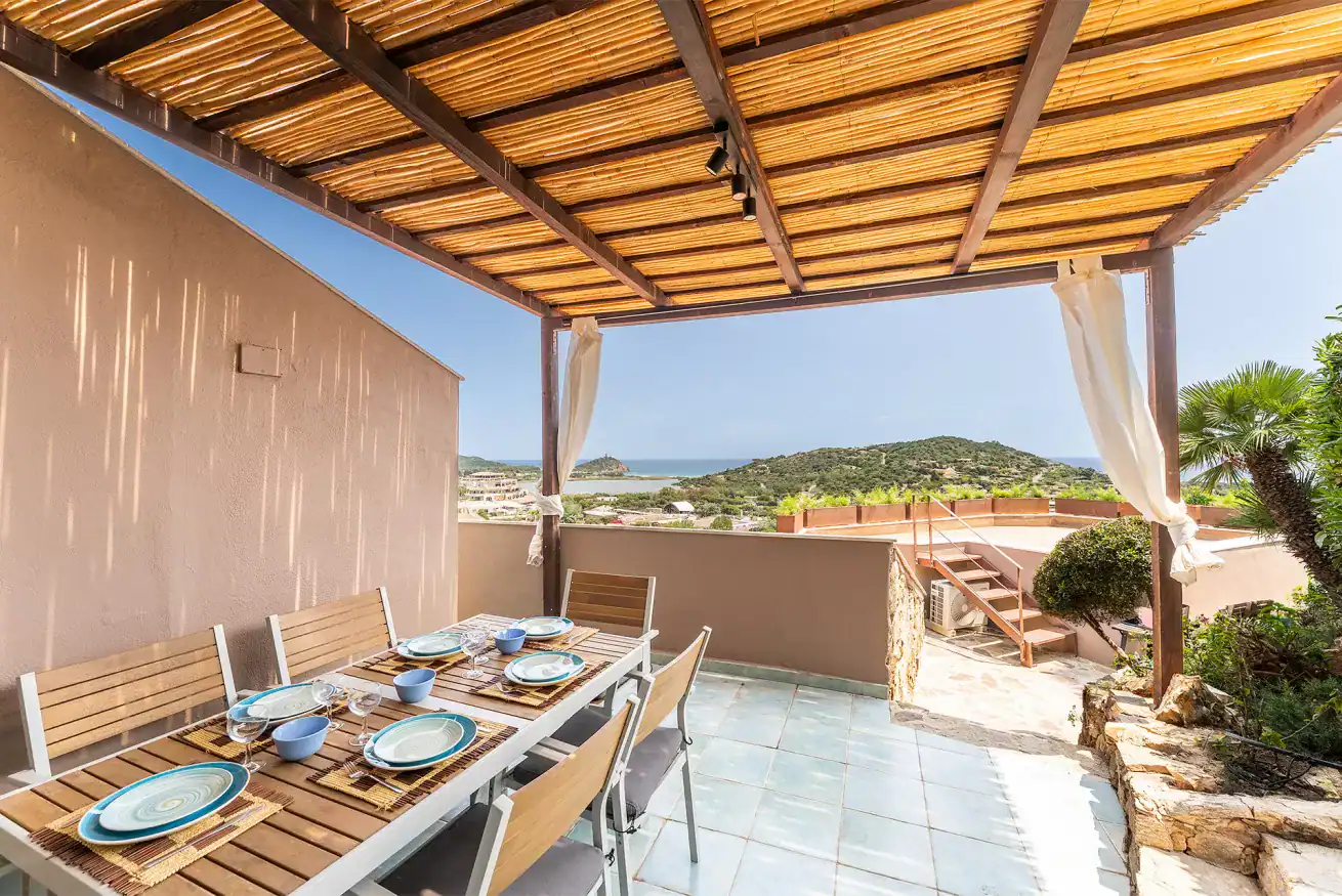 terrace with a table and sea views