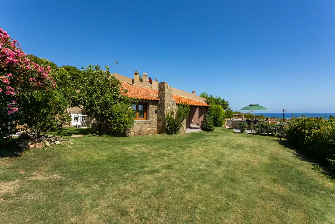 house with a garden and sea views